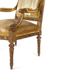 A Pair of Louis XVI Carved Giltwood Fauteuils