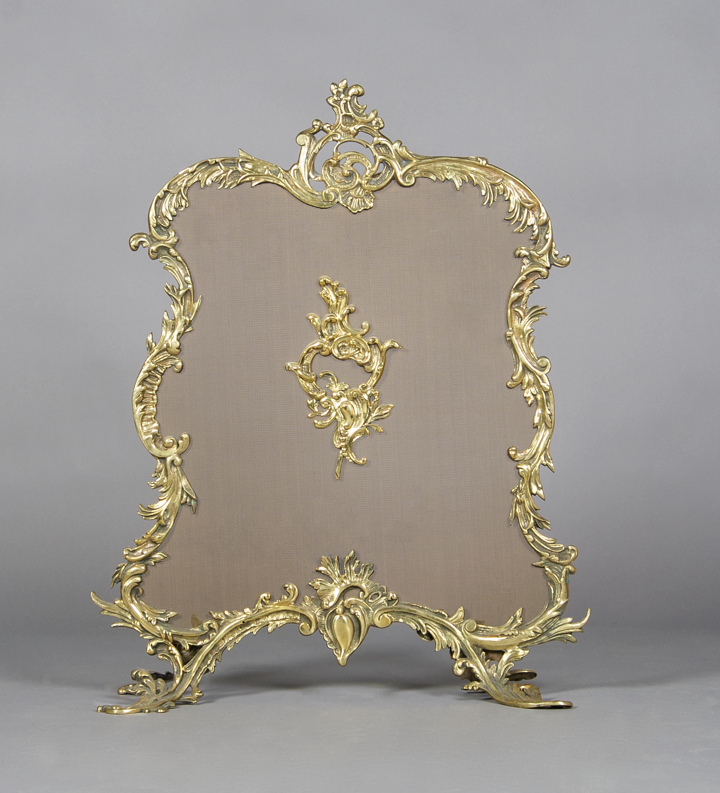 A Louis XV Style Gilt Metal Firescreen, Height 32 1/4 inches.