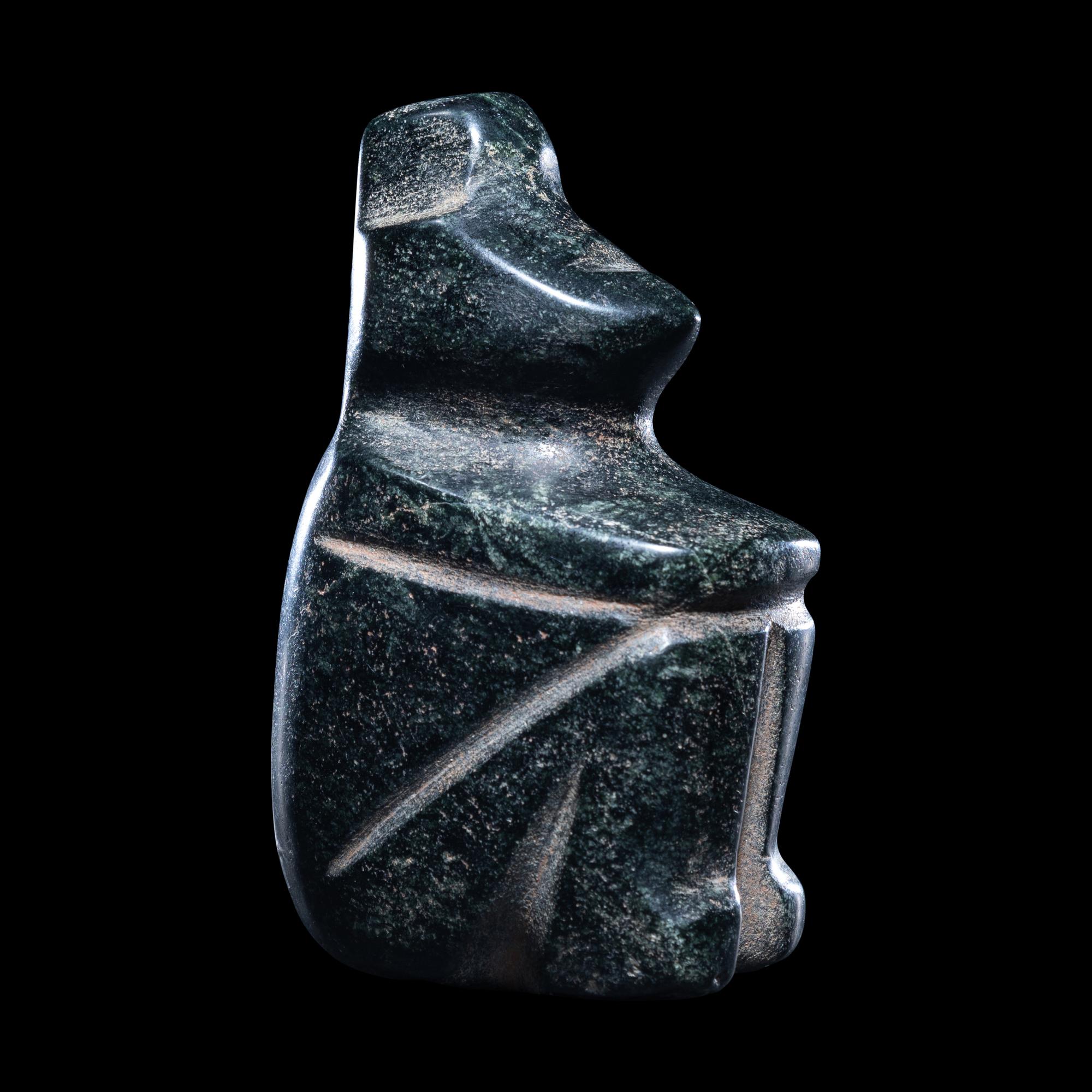A Mezcala Jade Seated Figure