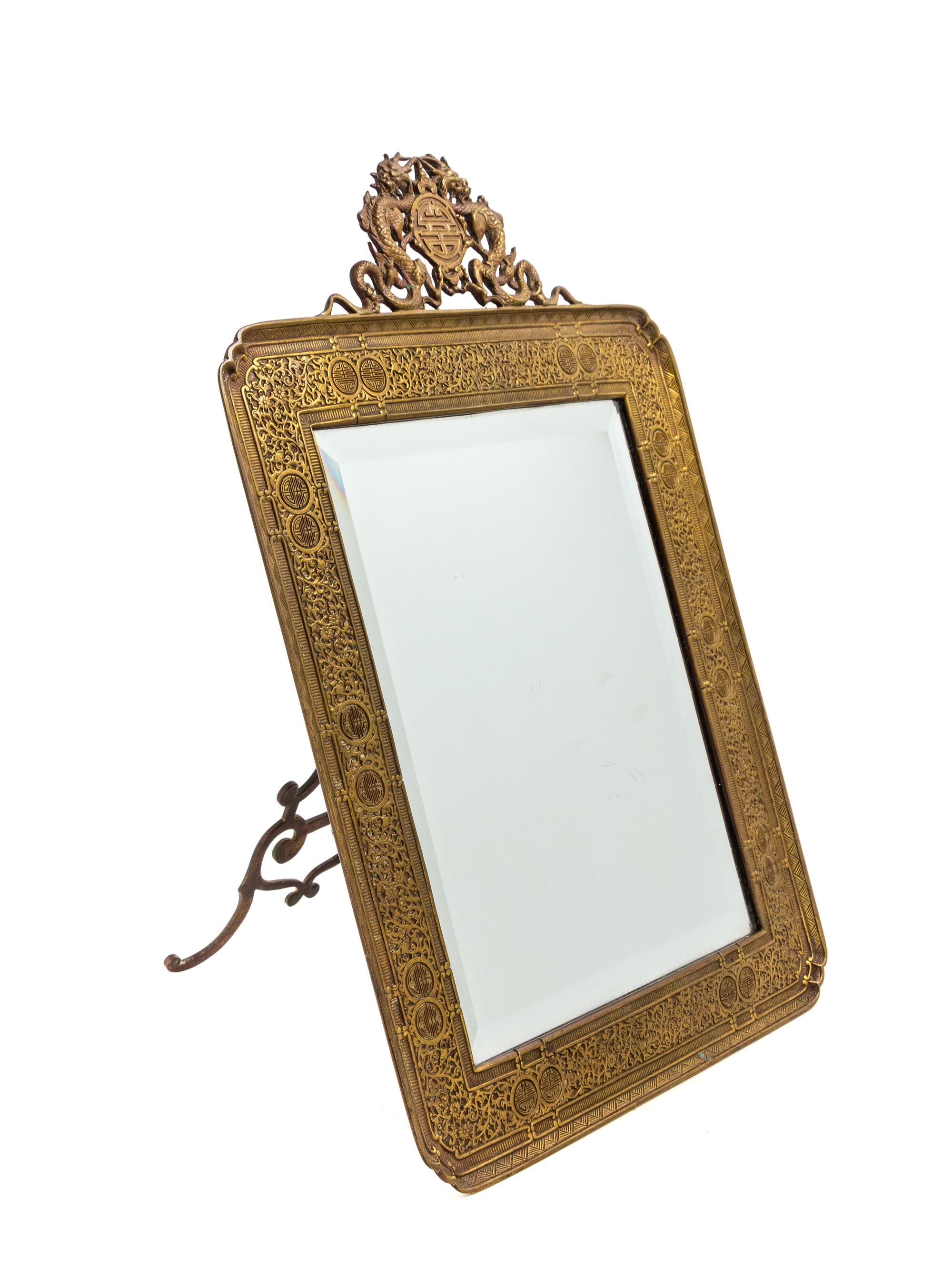 A Chinese Bronze Table Mirror