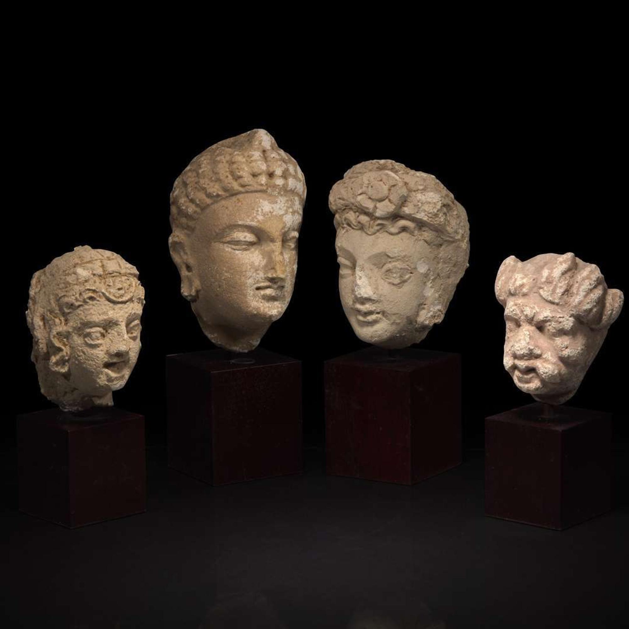 A group of four small stucco heads 石灰岩佛首一组四件 Gandhara, 4rd-5th Century ??? ?????