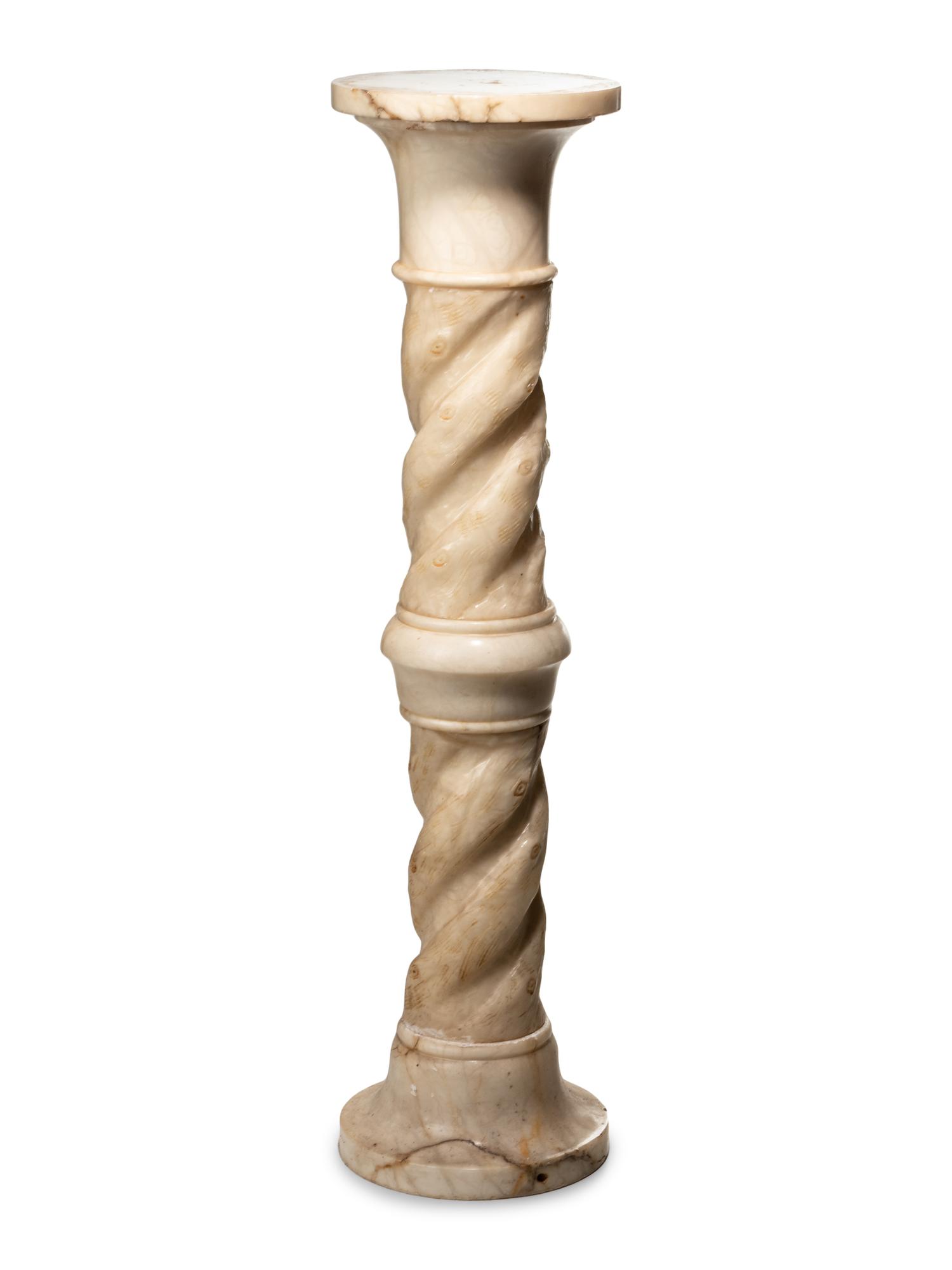 A Continental Carved Marble Pedestal
