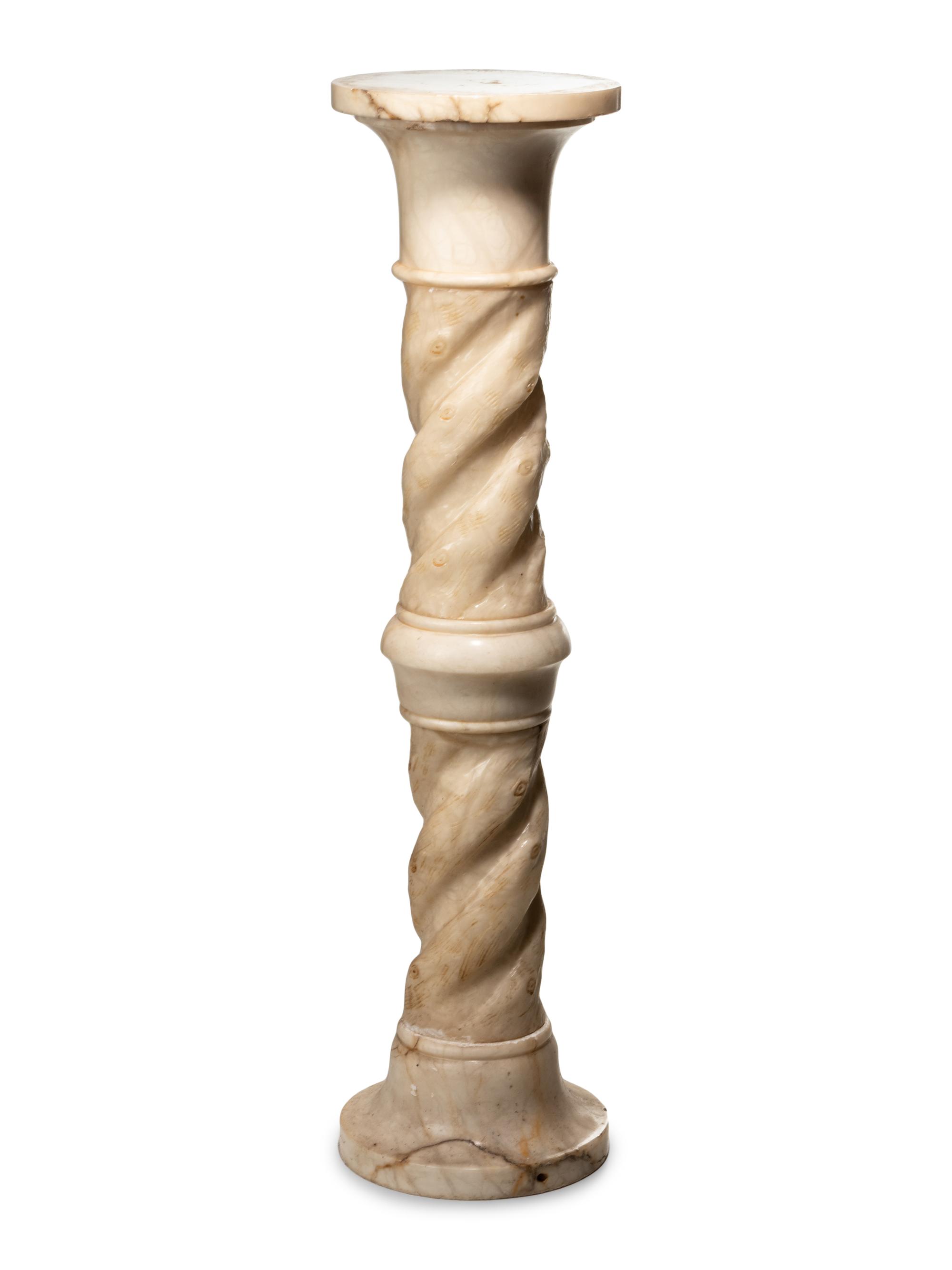 A Continental Carved Marble Pedestal