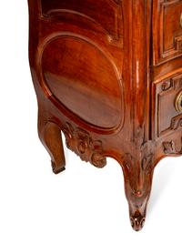 A Louis XV Provincial Carved Walnut Commode — LATE 18TH CENTURY