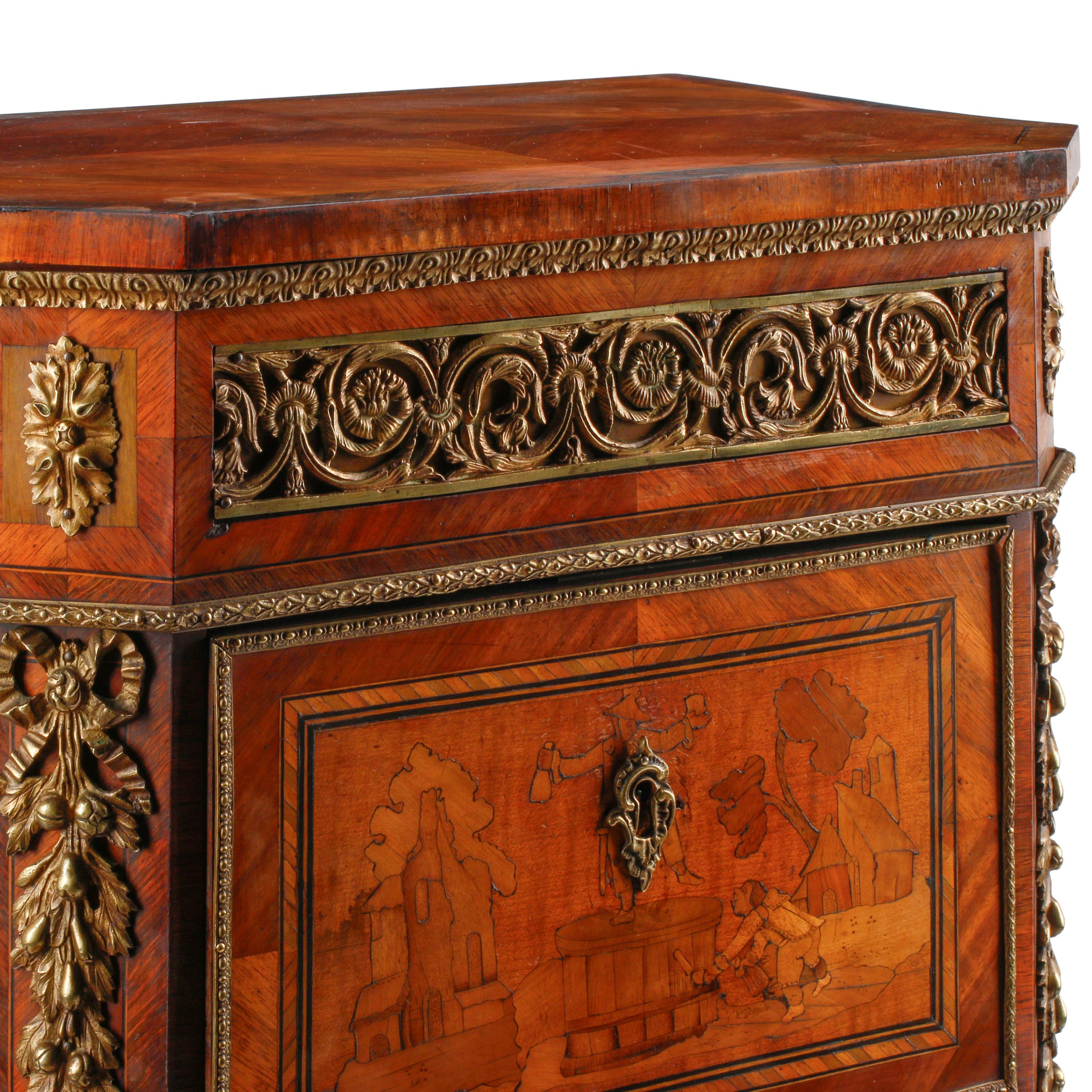 A Louis XVI Style Gilt Metal Mounted Marquetry Tall Chest of Drawers