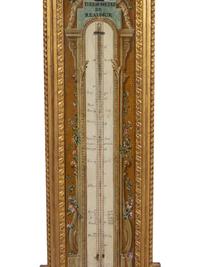 A Louis XVI Painted and Parcel Gilt Barometer and Thermometer