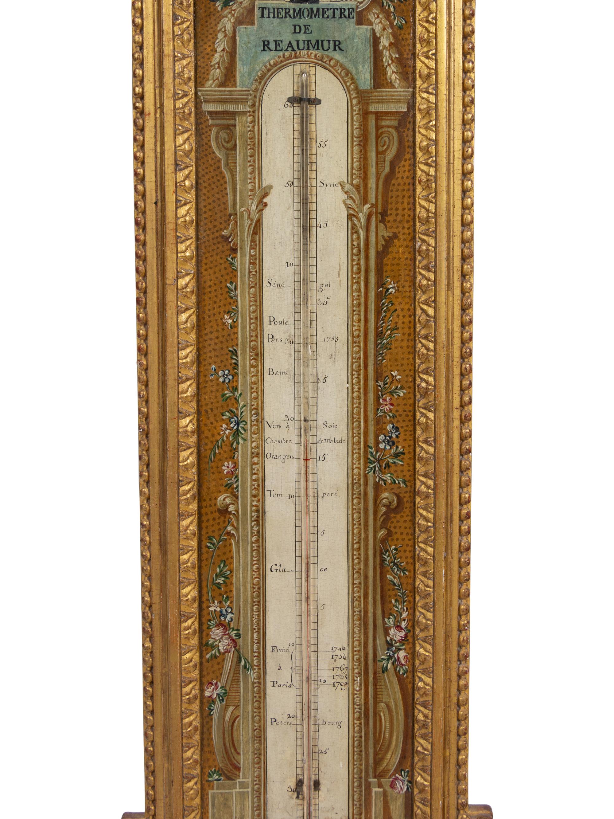 A Louis XVI Painted and Parcel Gilt Barometer and Thermometer