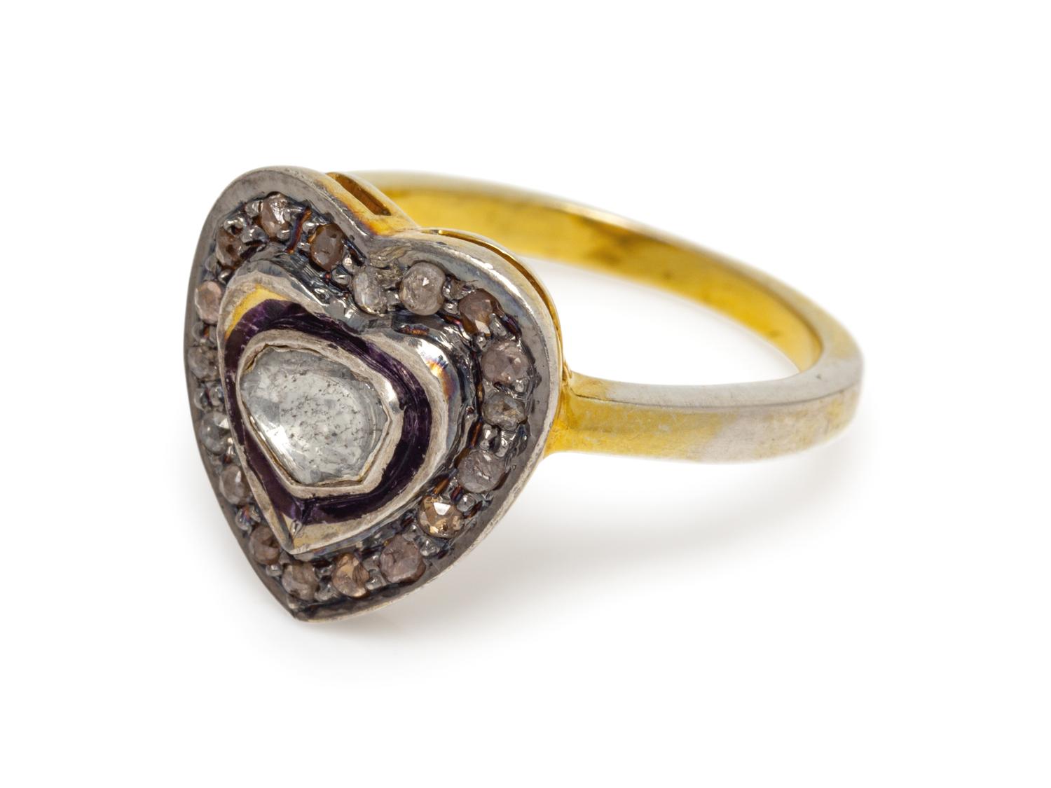 A Silver Topped Yellow Gold Plated and Diamond Heart Motif Ring,