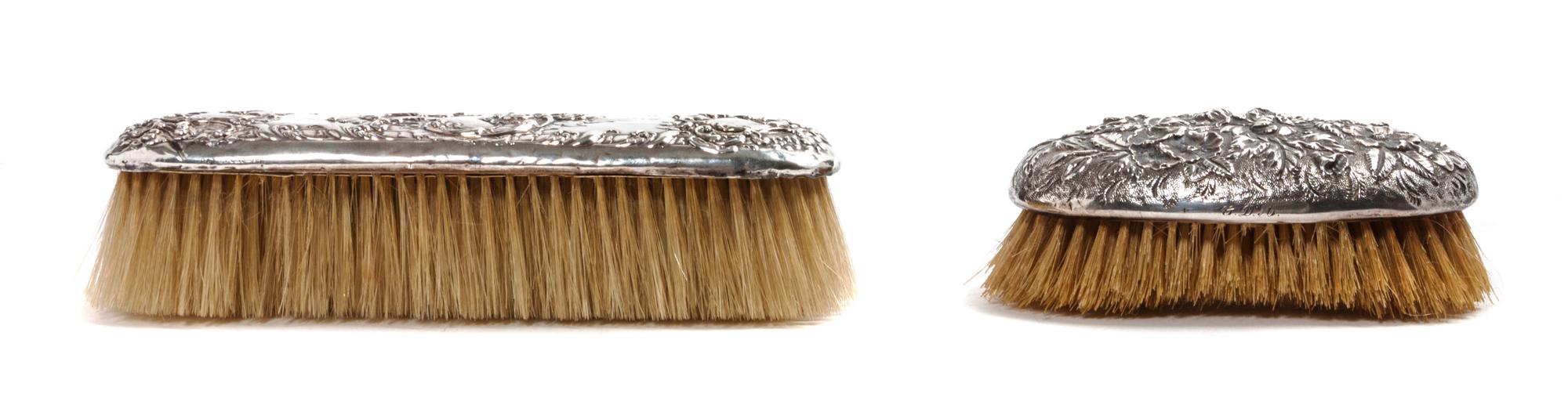 An American Silver Handled Brush, S. Kirk & Sons, Baltimore, MD, together with a silver brush by an unknown maker.