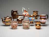 Twenty Lusterware Pitchers and Creamers
