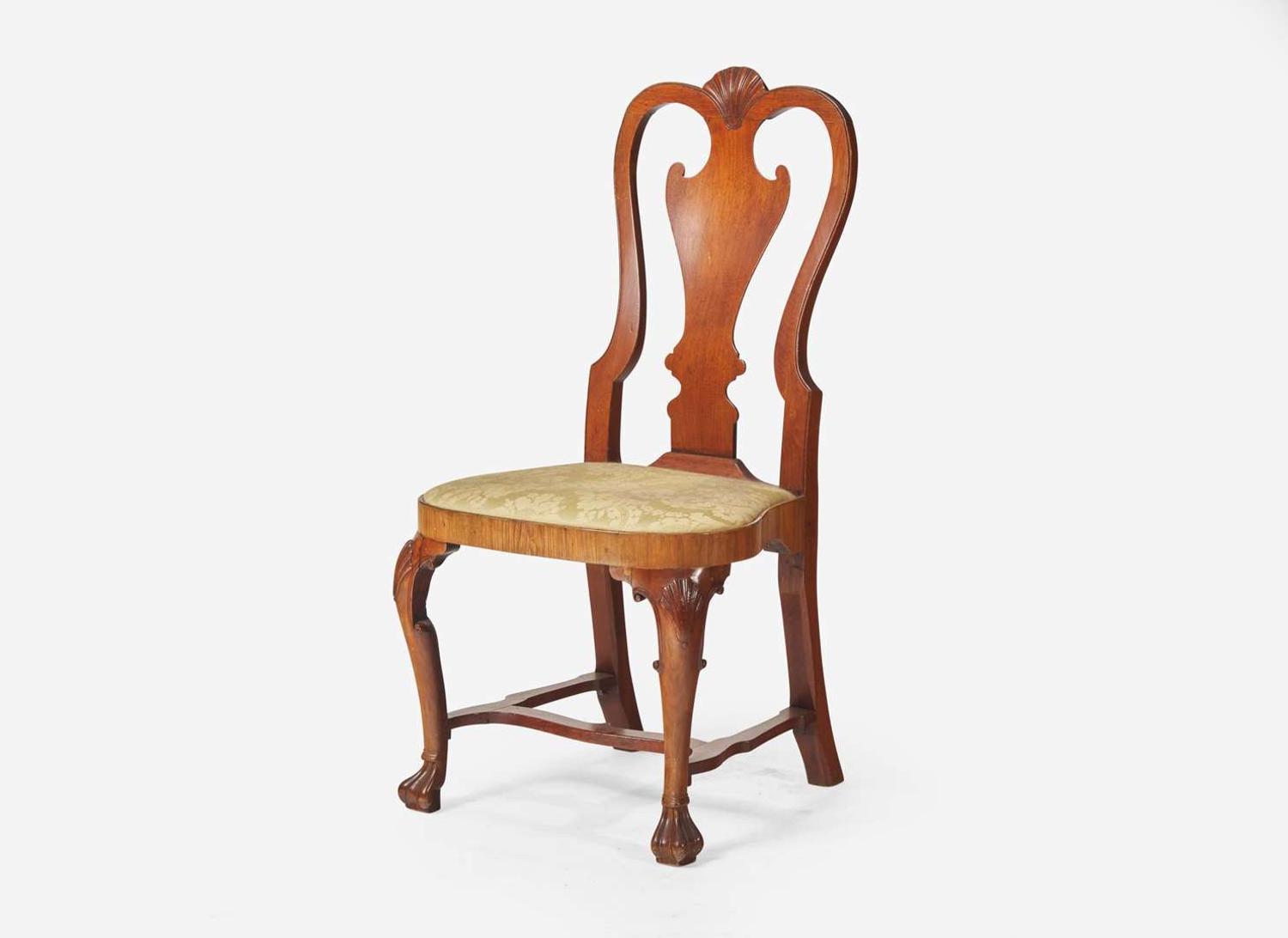 A Queen Anne carved walnut balloon seat side chair, Ireland, circa 1725