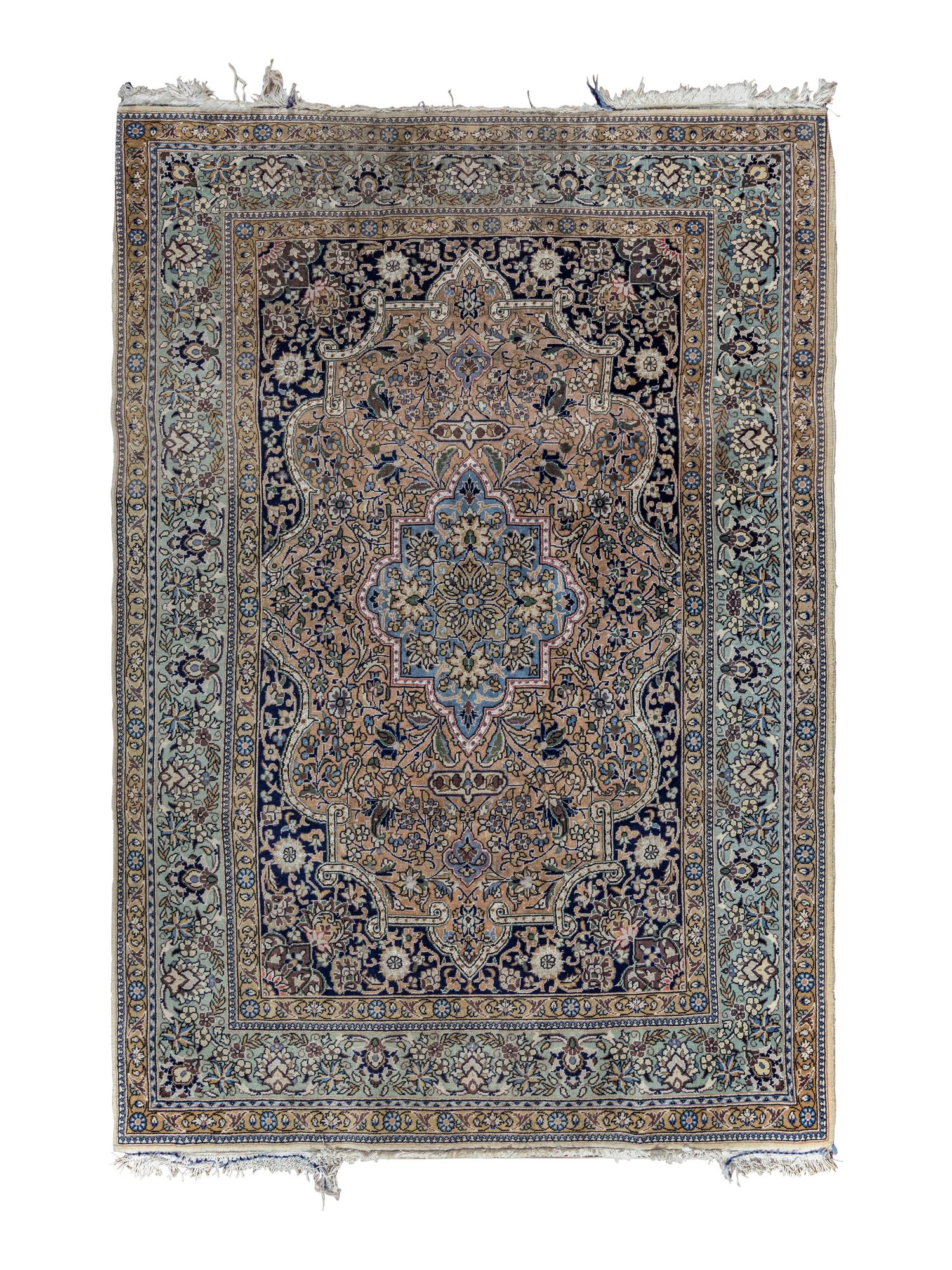 A Qum Silk and Wool Rug