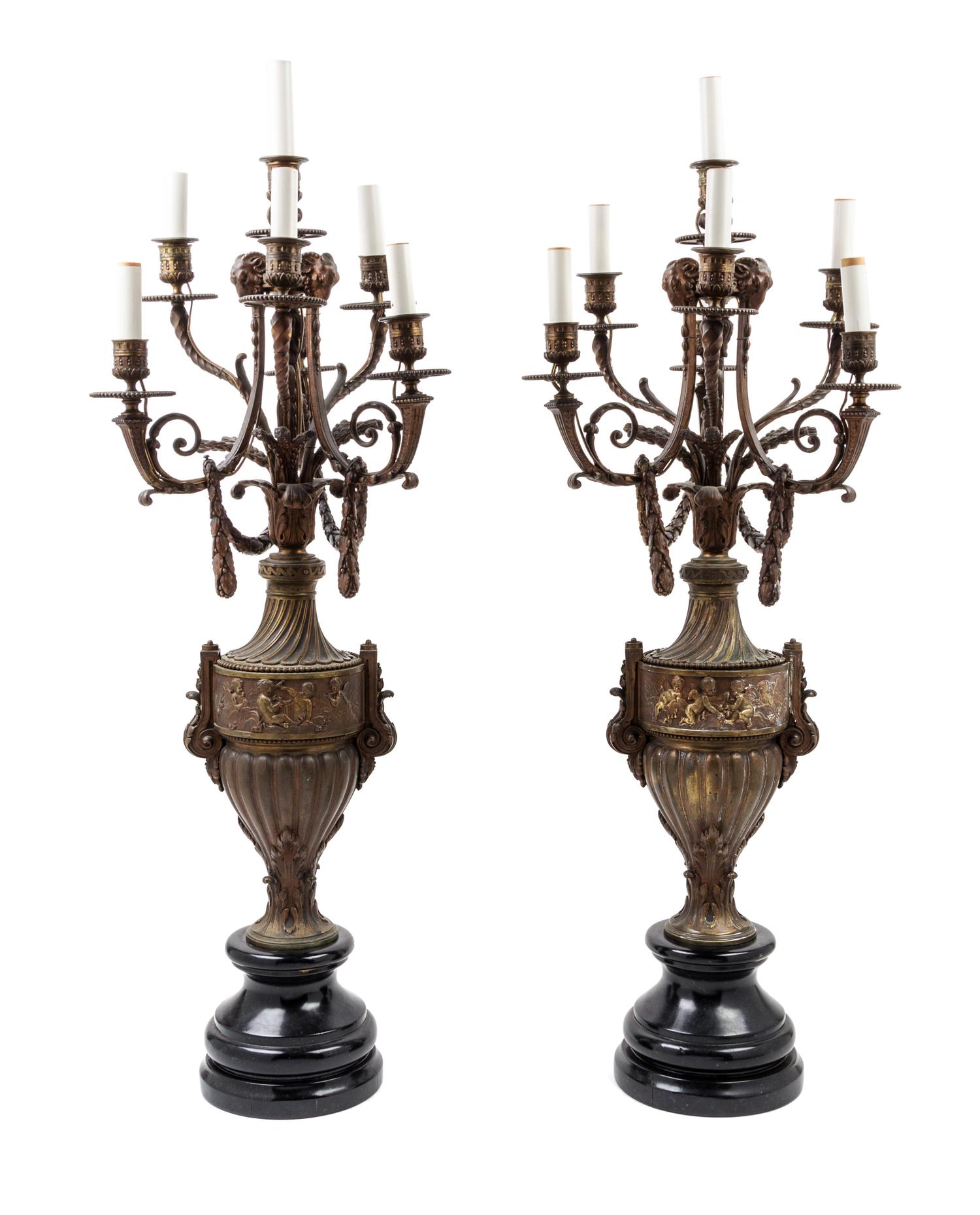 A Pair of Continental Bronze Candelabra Height 39 inches.