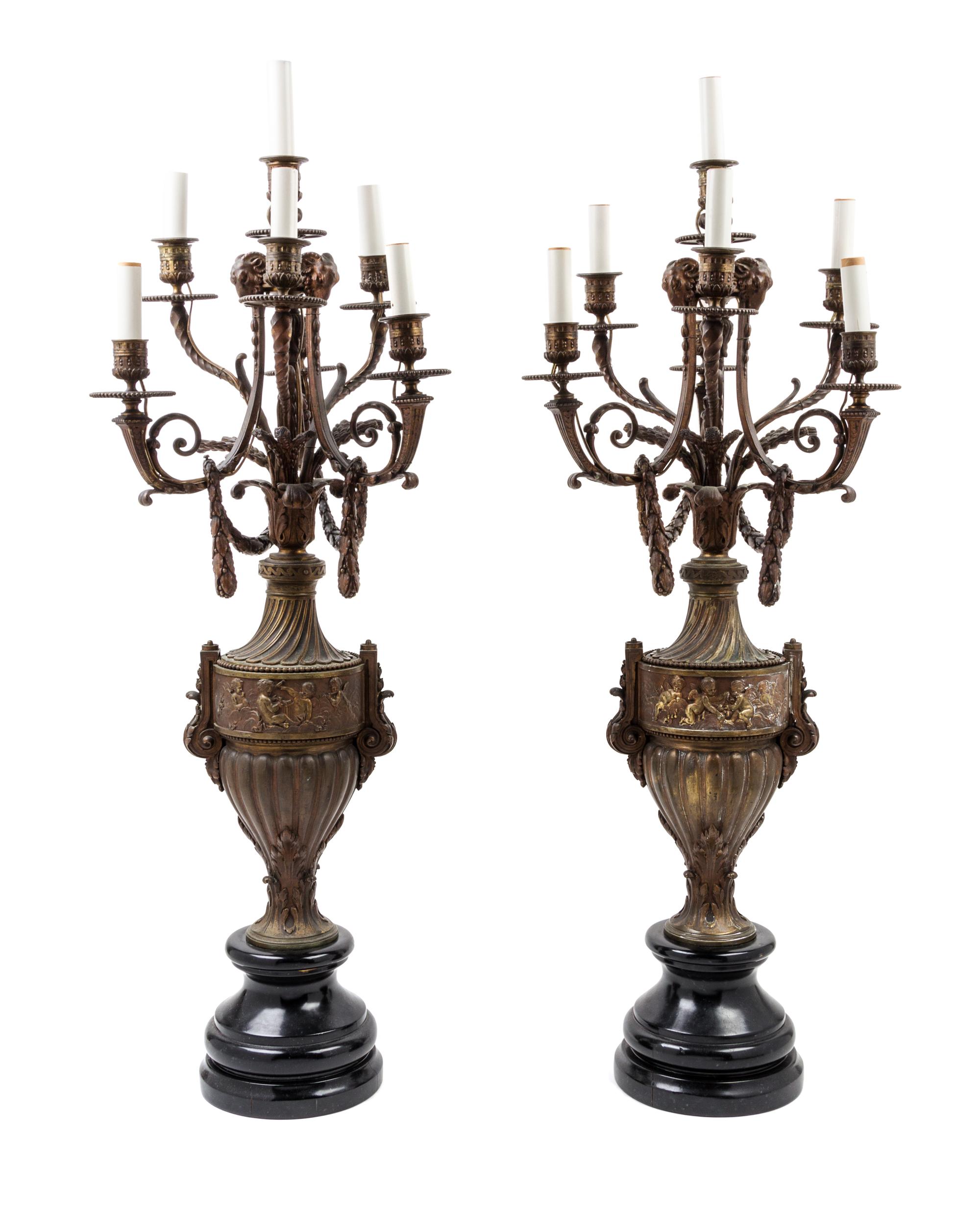 A Pair of Continental Bronze Candelabra Height 39 inches.