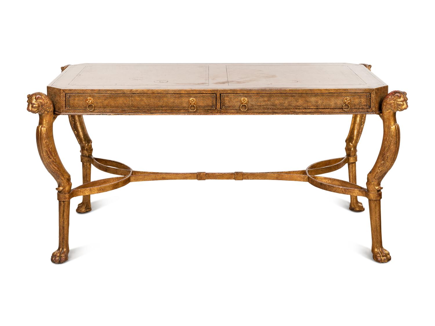 A Regency Style Gilt Metal and Leather Veneered Desk