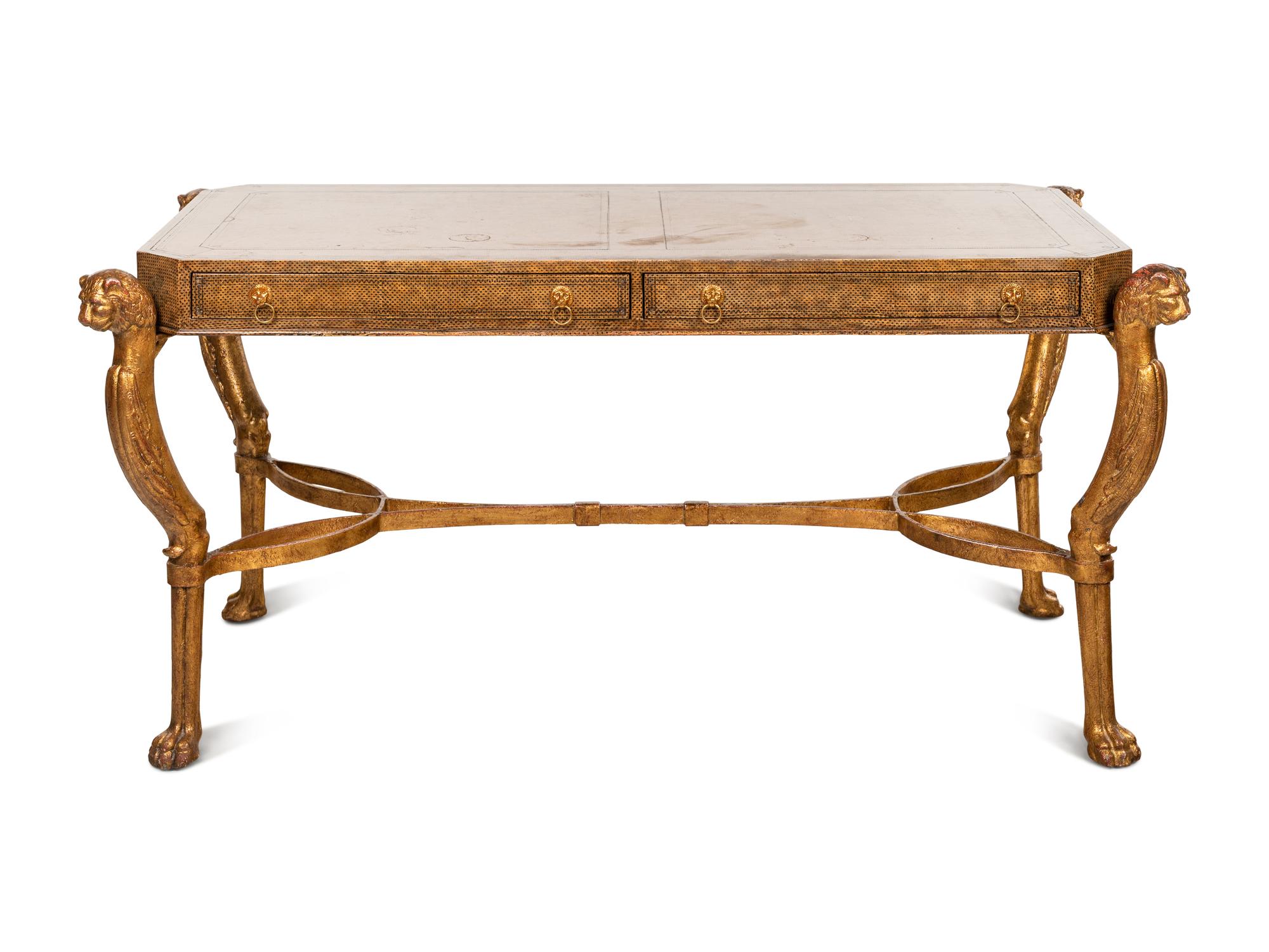 A Regency Style Gilt Metal and Leather Veneered Desk