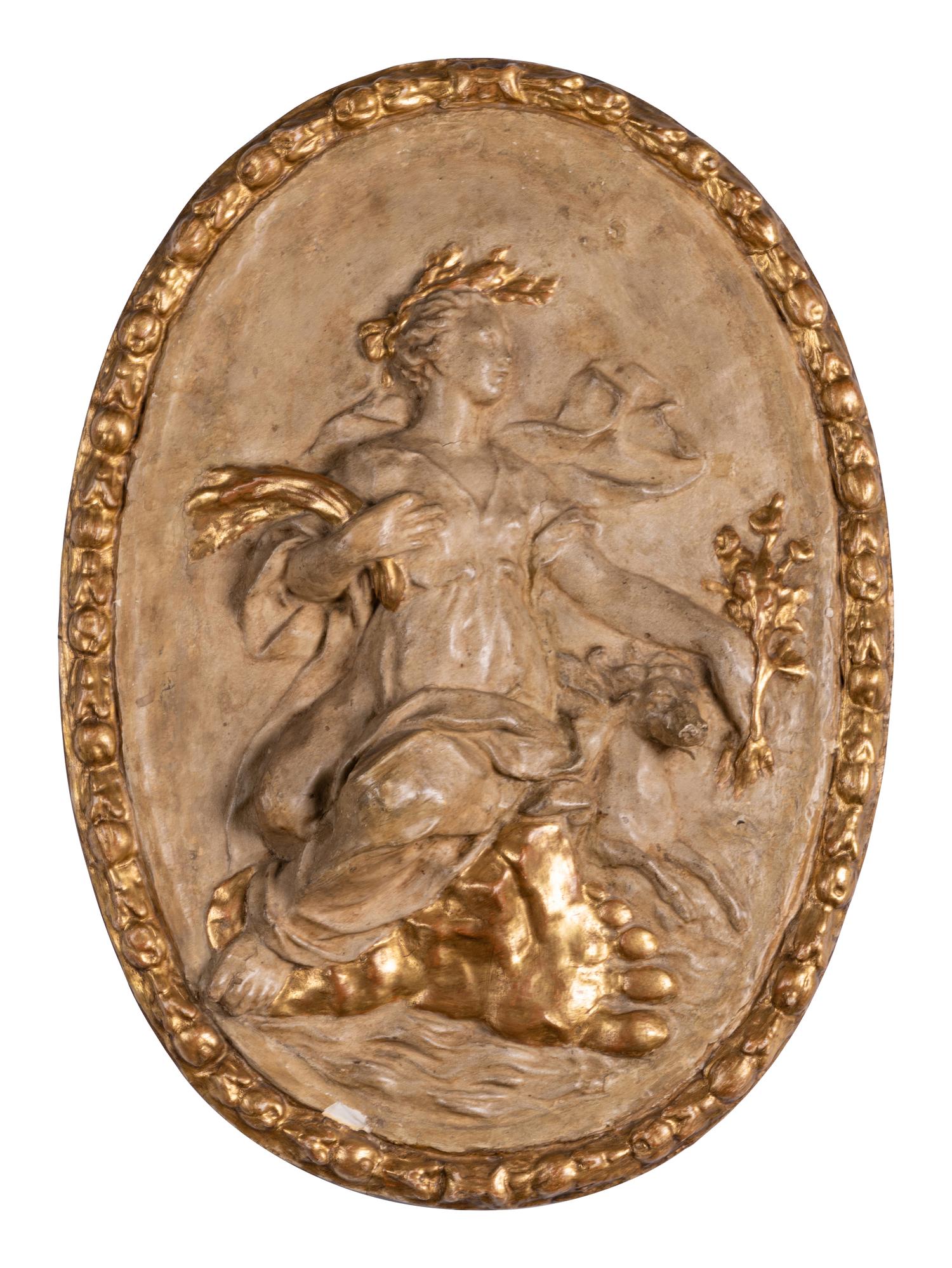 Four Italian Neoclassical Painted and Parcel-Gilt Papier-Mâché Relief Plaques