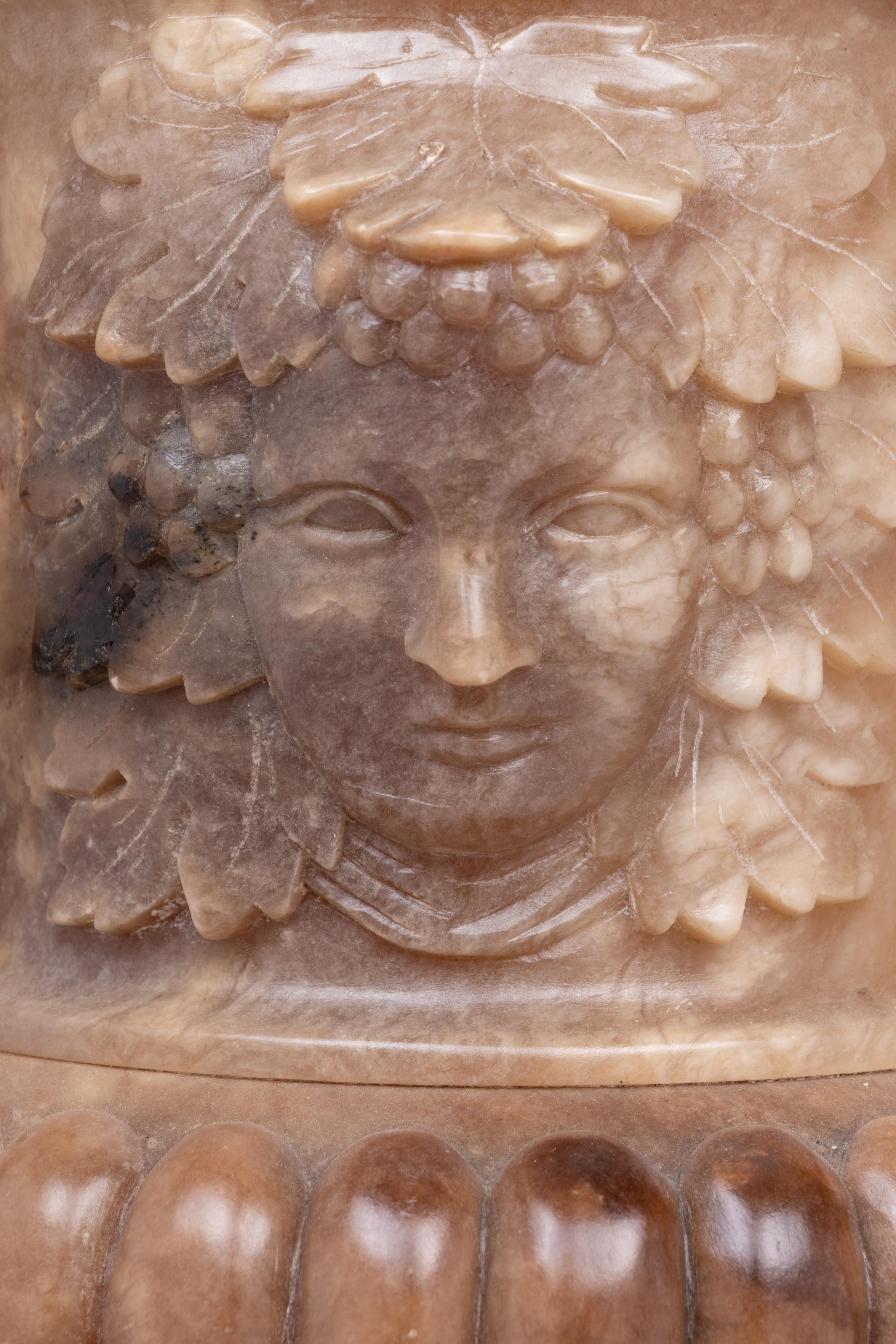 A Pair of Carved Alabaster Urns
