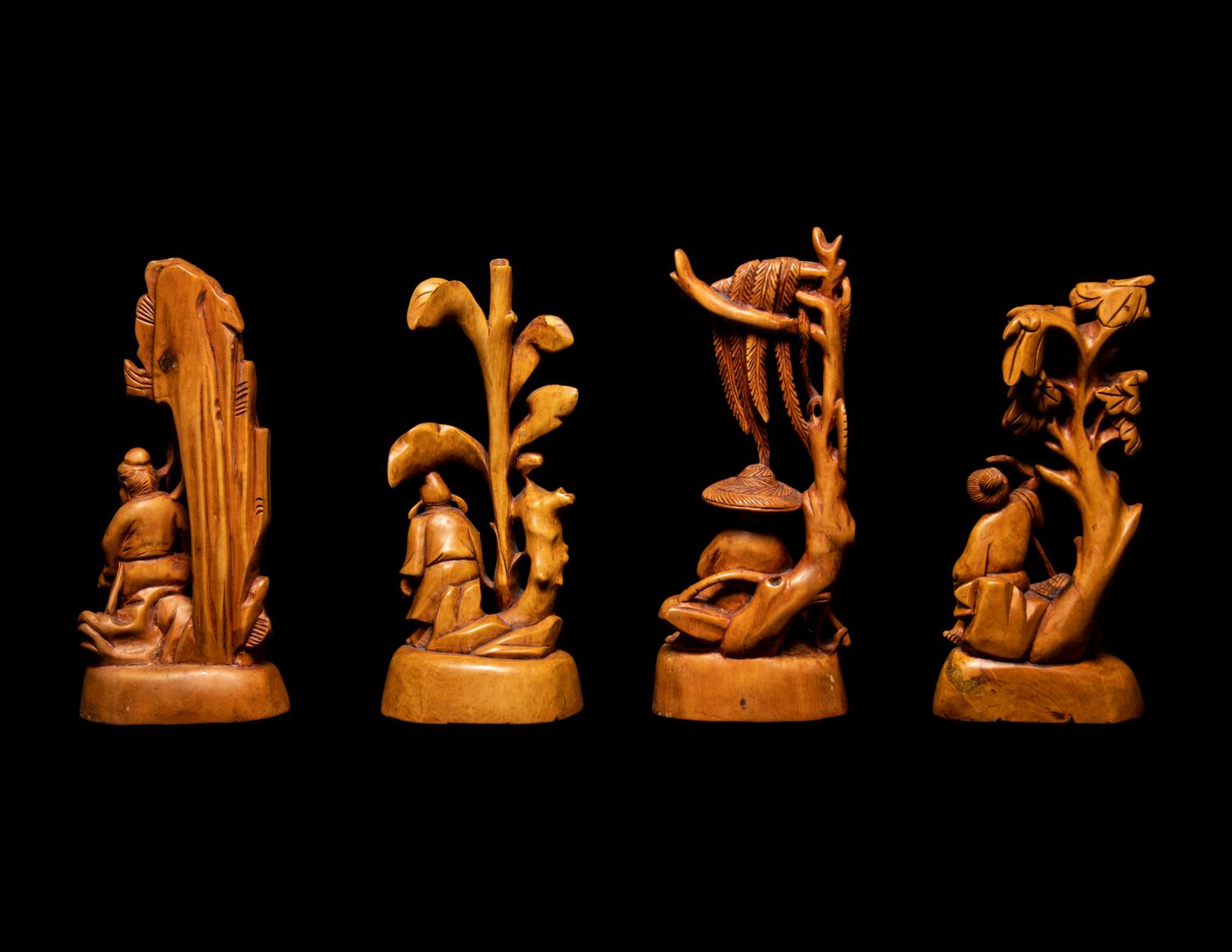 Seven Chinese Carved Hardwood Figures