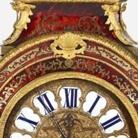 A Louis XIV Ormolu-Mounted Brass-Inlaid Red Tortoiseshell Boulle Marquetry Mantel Clock on Stand* 18th century with later alterations and additions, Louis Mynuel (French, 1675-1742)