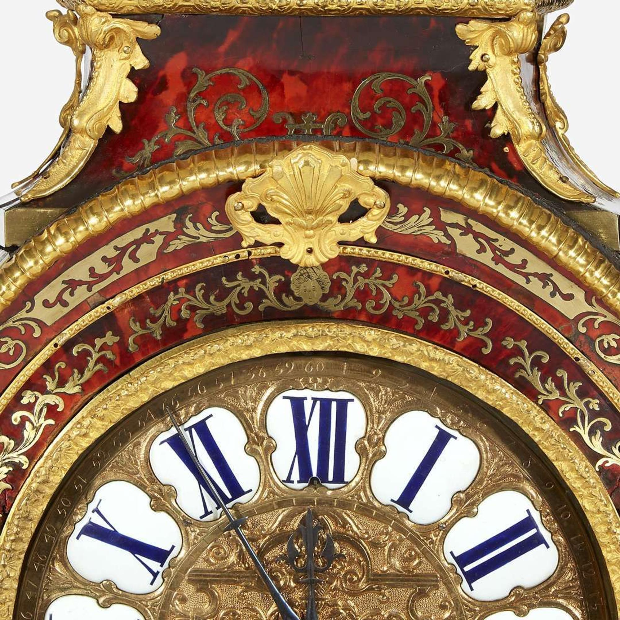 A Louis XIV Ormolu-Mounted Brass-Inlaid Red Tortoiseshell Boulle Marquetry Mantel Clock on Stand* 18th century with later alterations and additions, Louis Mynuel (French, 1675-1742)