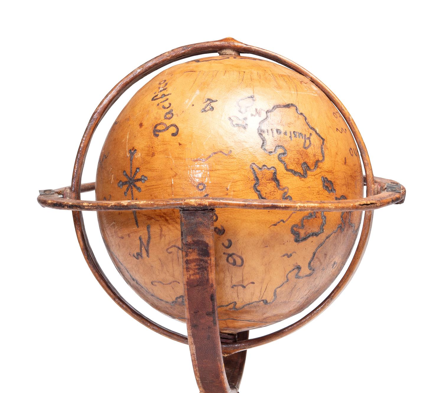 A Folk Art Painted Leather Covered Tabletop Globe