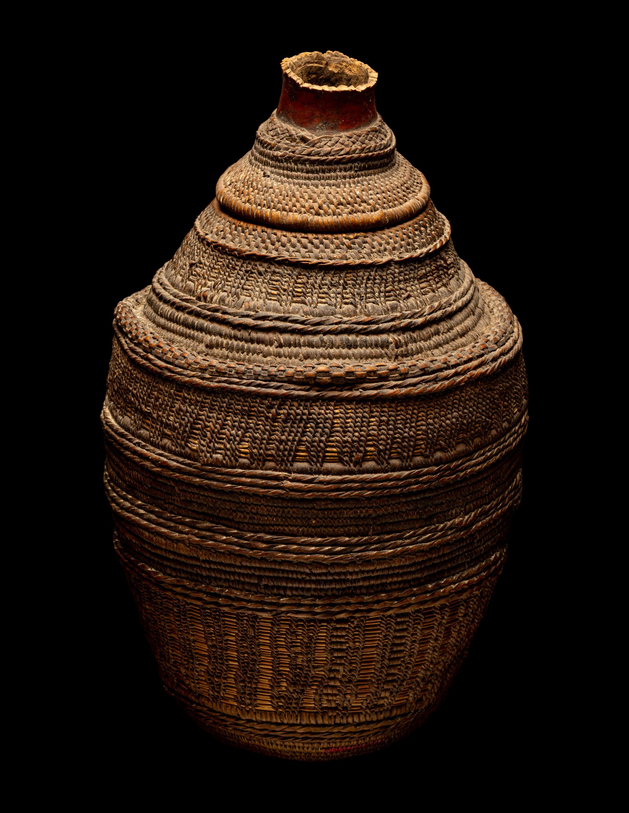 Eleven Oceanic and African Drums, Baskets, and Tools