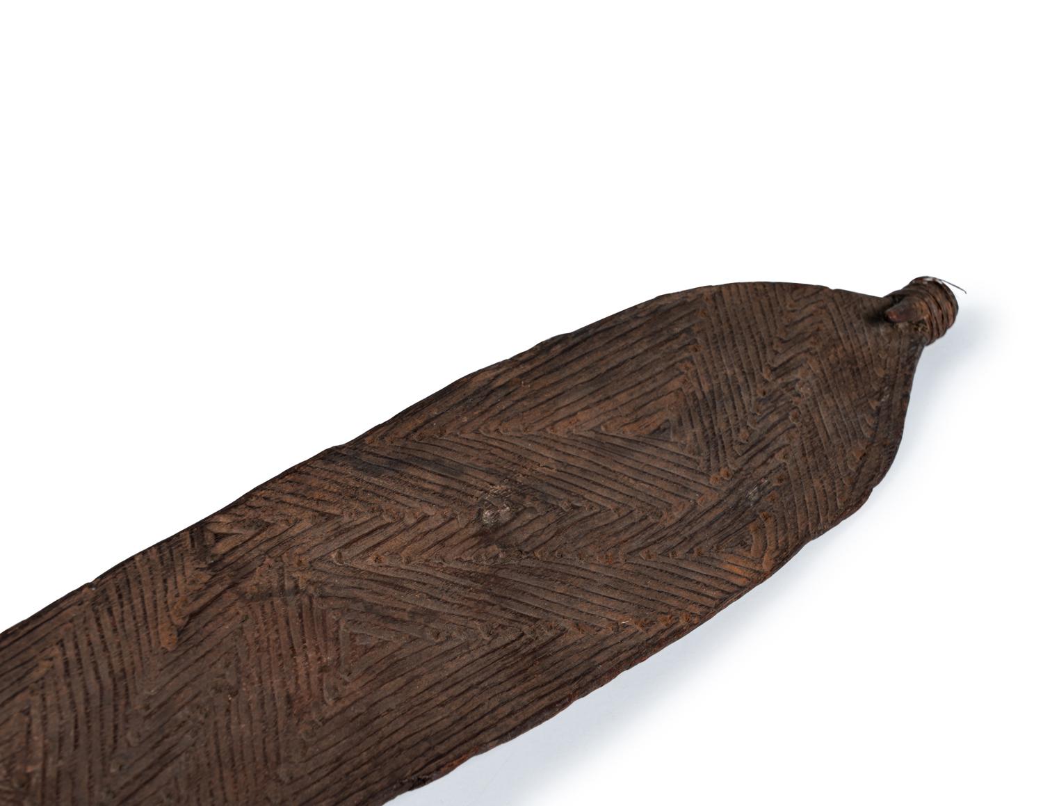 An Aboriginal Wood Spear Thrower (woomera)