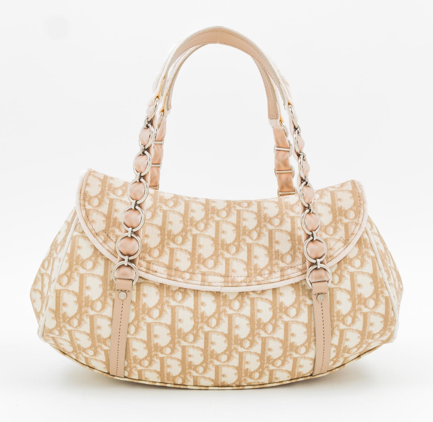 A Christian Dior Monogram Romantique Trotter Bag, 12" x 7" x 4"; Handle drop: 6".