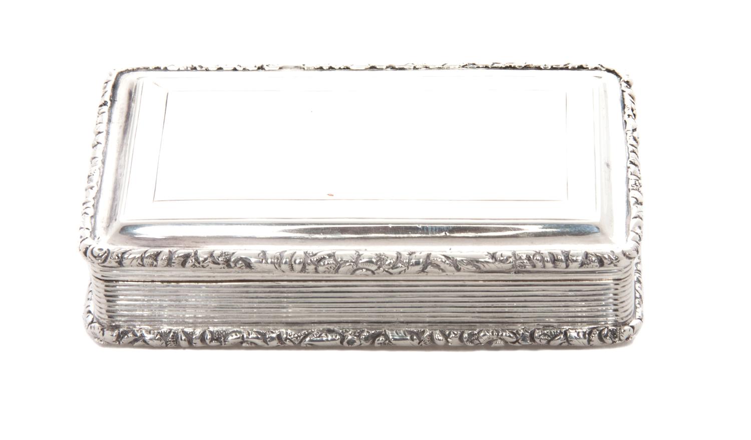 A Victorian Silver Snuff Box, Nathaniel Mills, Sheffield, Mid-19th Century, rectangular form with applied foliate borders and an engine