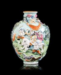 A Chinese Molded Famille Rose Porcelain Snuff Bottle