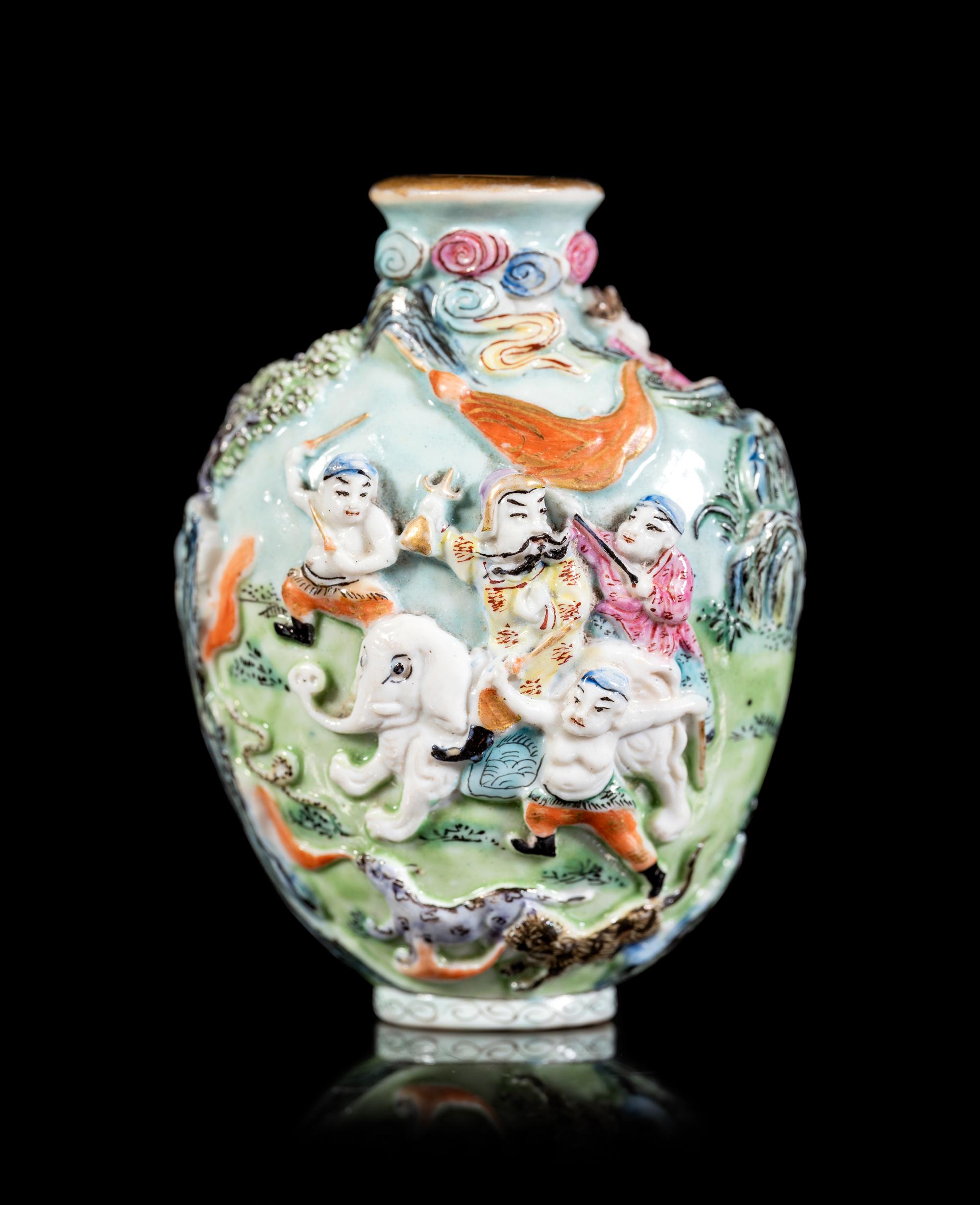 A Chinese Molded Famille Rose Porcelain Snuff Bottle