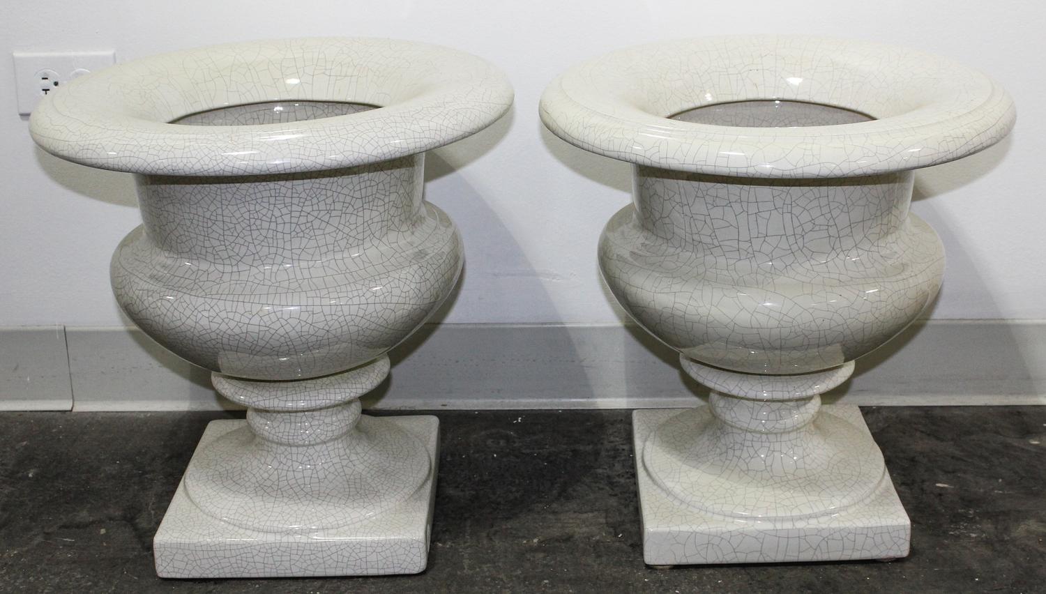 A Pair of Glazed Ceramic Urns Height 17 1/2 inches. — 20TH CENTURY
