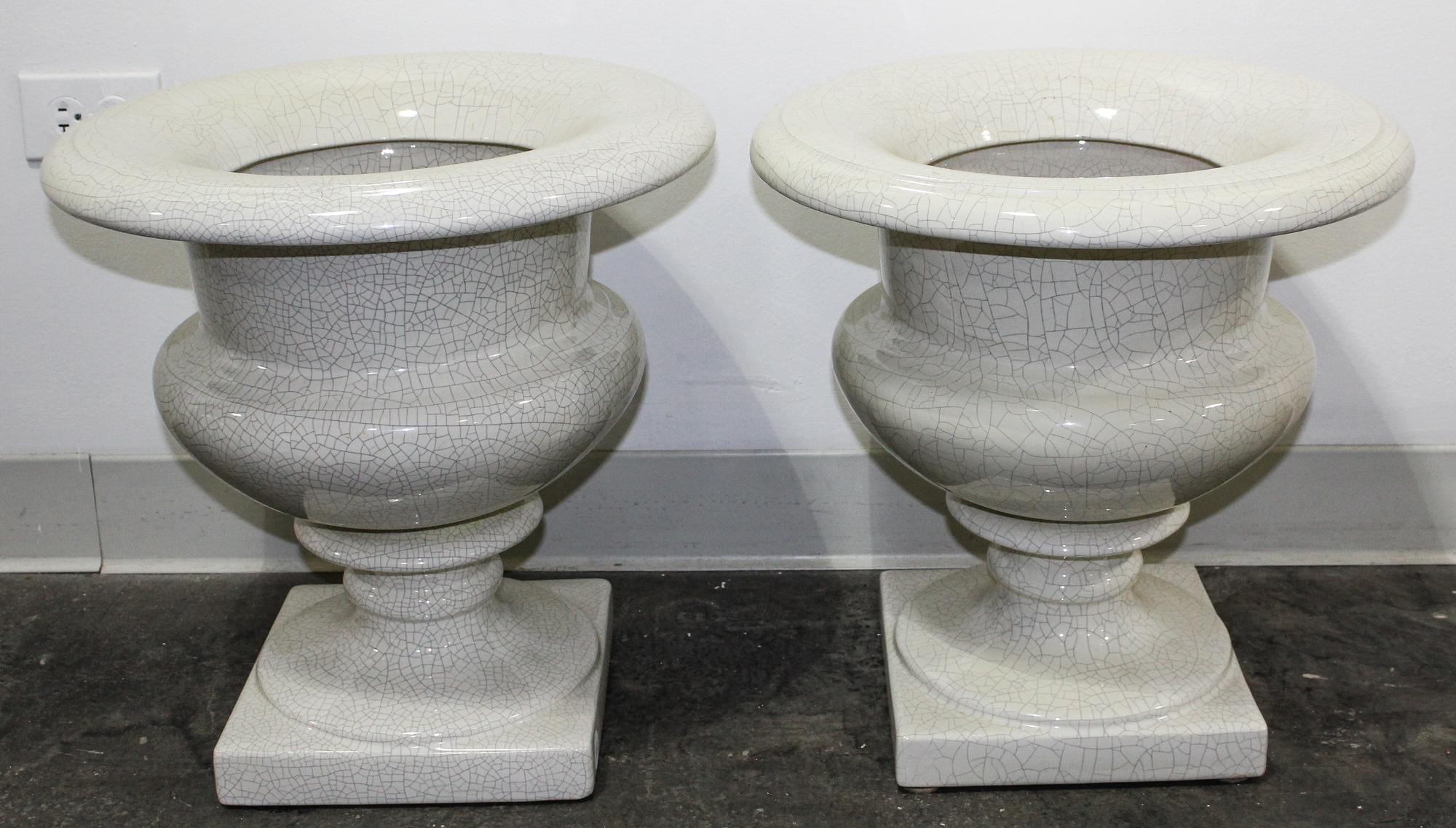 A Pair of Glazed Ceramic Urns Height 17 1/2 inches. — 20TH CENTURY