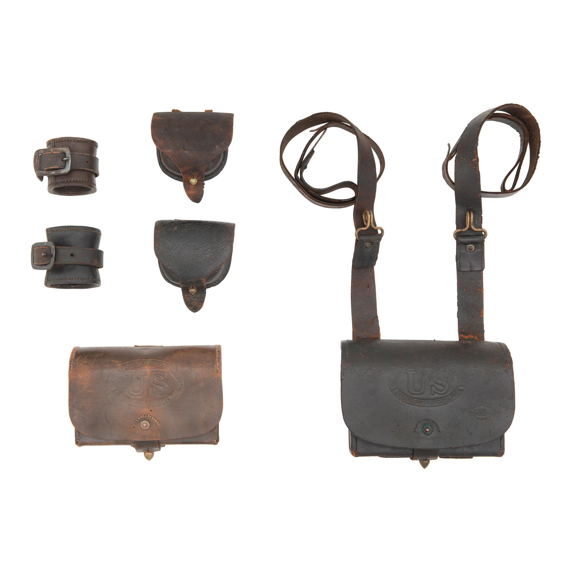 Group of Civil War Era Accoutrements: 2 Mann's Patent Cartridge Boxes, 2 Cap Pouches and 2 Carbine Sockets