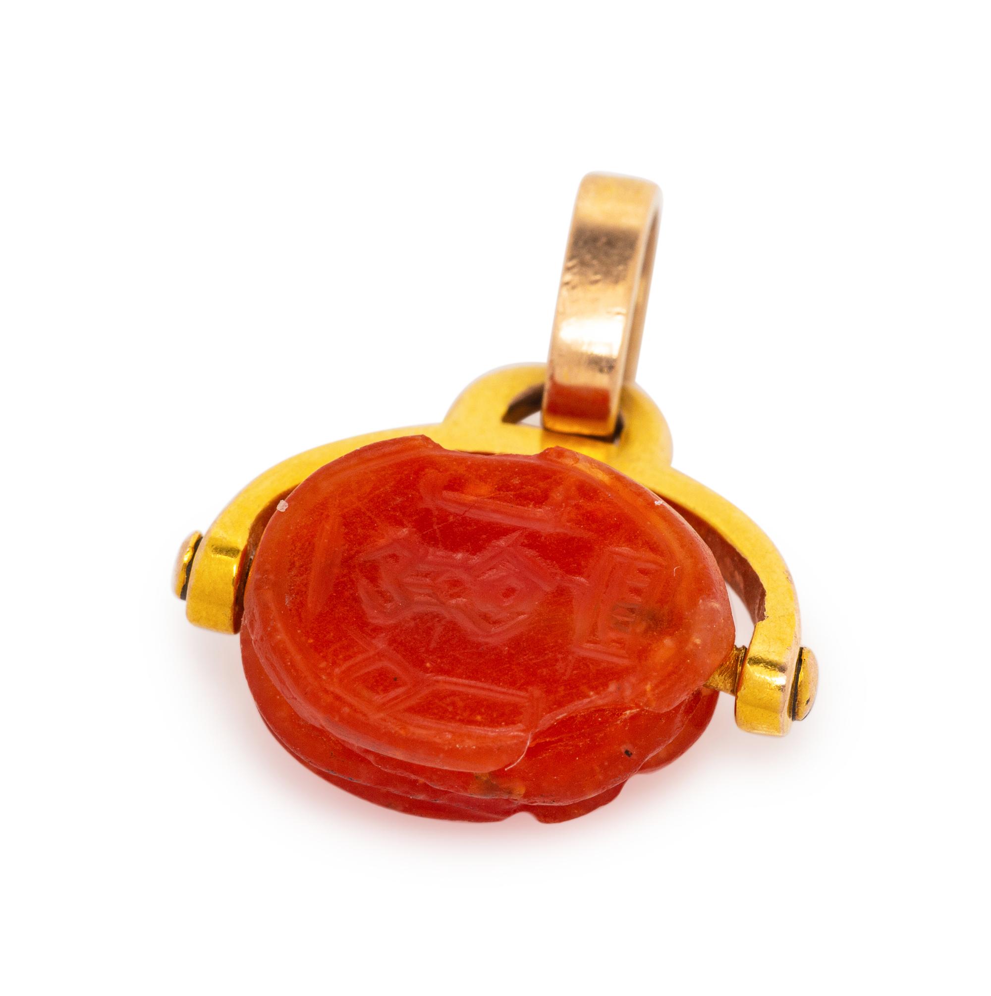A Possibly Ancient Yellow Gold and Carved Carnelian Scarab Pendant,