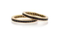 A Pair of Yellow Gold and Sapphire Eternity Bands, 3.20 dwts.