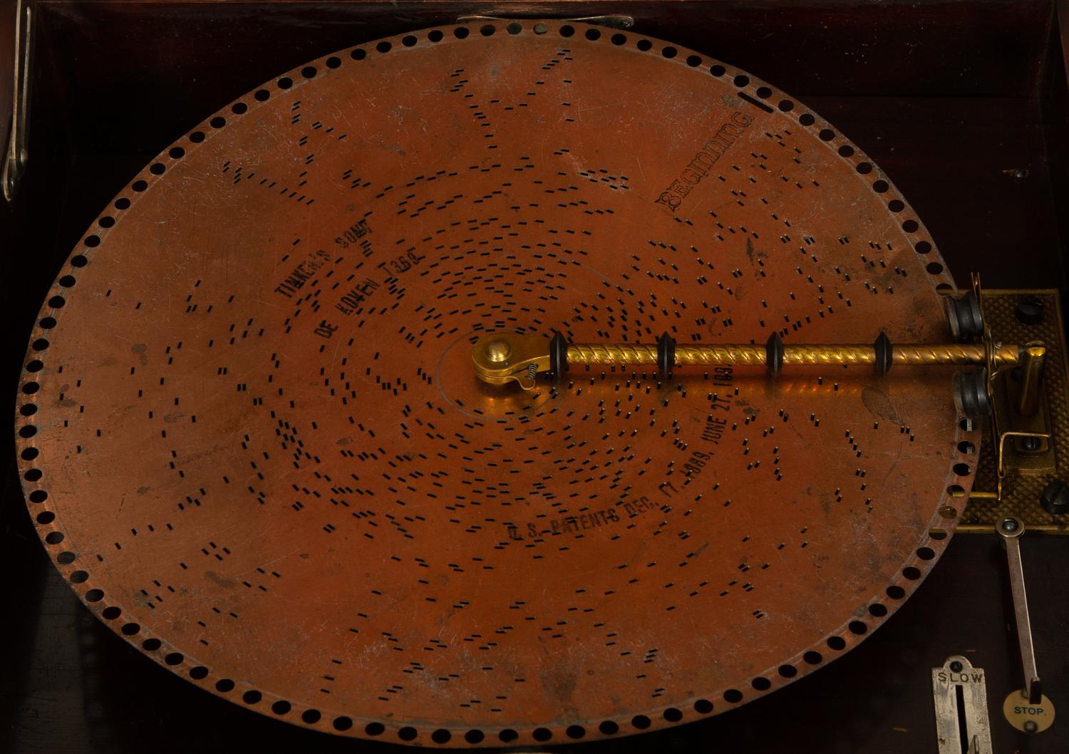 A Regina Mahogany Serpentine Cabinet Music Box