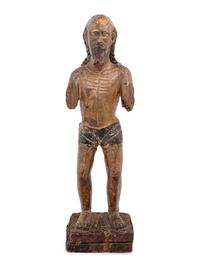 A Colonial Carved and Polychromed Figure of Christ