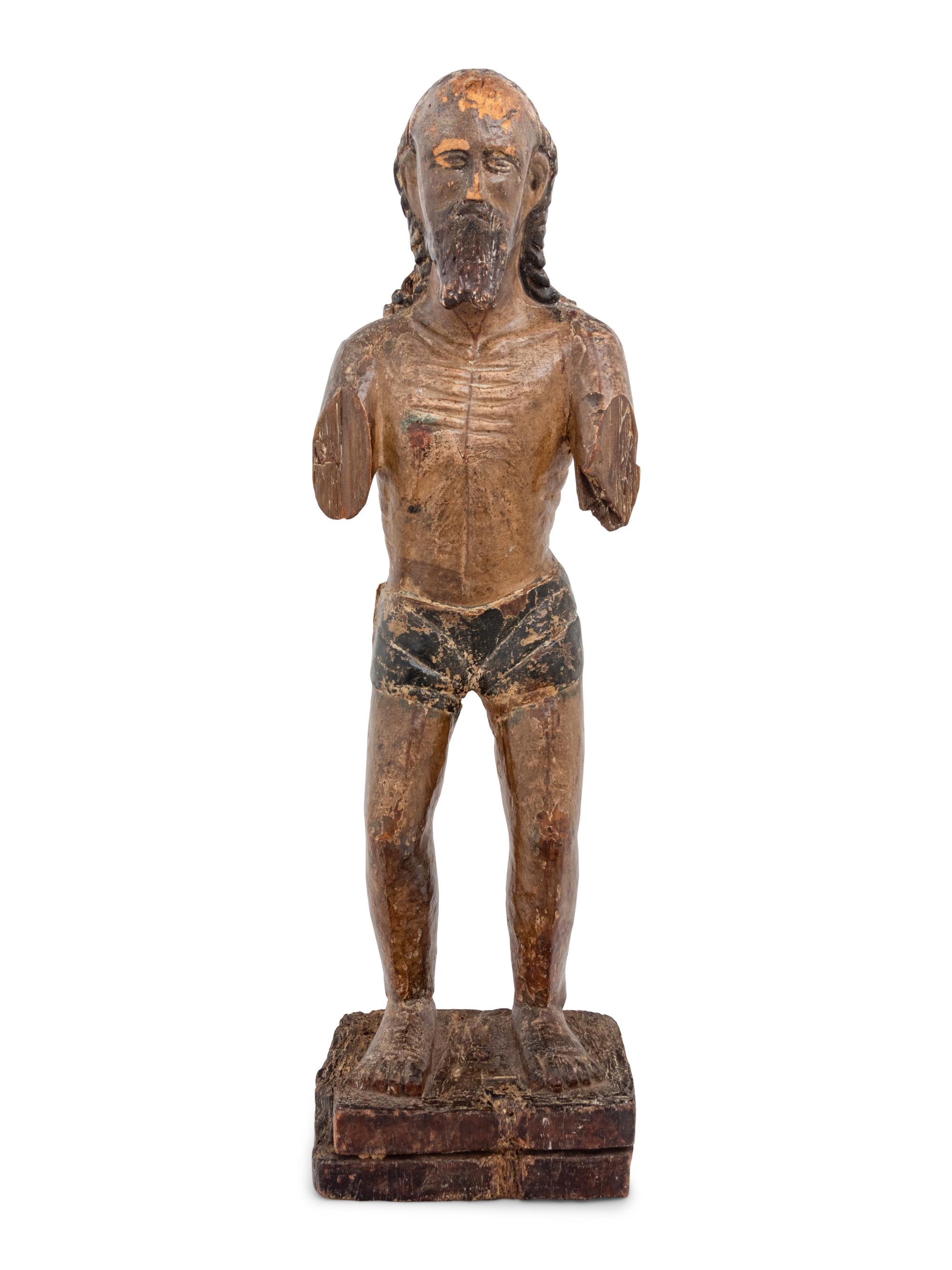 A Colonial Carved and Polychromed Figure of Christ