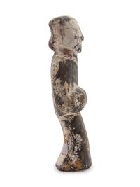 A Chinese Pottery Figure of a Female Attandant