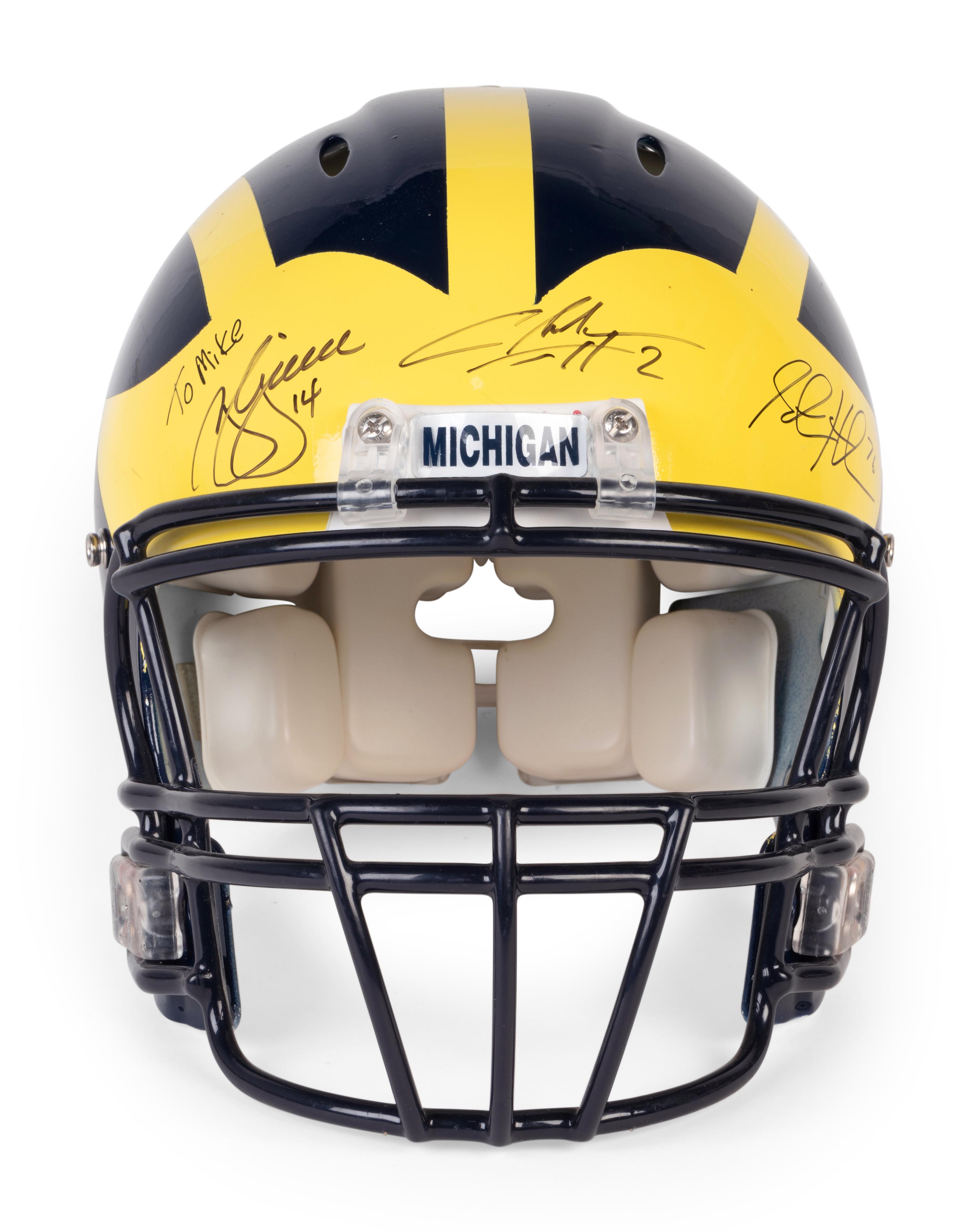 A Multi Signed 1997 University of Michigan Signed Autograph Riddell Full Size Football Helmet Including Charles Woodson and Lloyd Carr (BAS Beckett Authentication Services Certified),