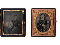 [CIVIL WAR]. Sixth plate tintype portrait of a Civil War drummer with hand tinting. [With:] sixth plate portrait of a young woman, likely his wife.