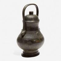 A Chinese archaistic patinated bronze covered wine vessel, you 倣古风格卣 late Ming/Qing dynasty ?????