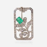 An 18K White Gold, Diamond, and Emerald Brooch