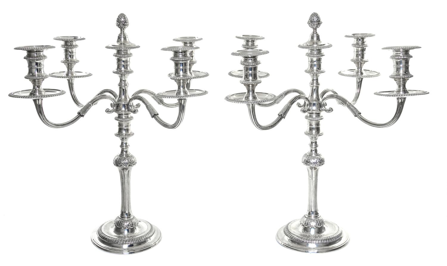 A Pair Elizabeth II Silver Five-Light Candelabra, Garrard & Co, London, 1925, each central cup with a removable pine-cone finial surmou