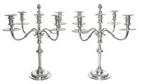 A Pair Elizabeth II Silver Five-Light Candelabra, Garrard & Co, London, 1925, each central cup with a removable pine-cone finial surmou