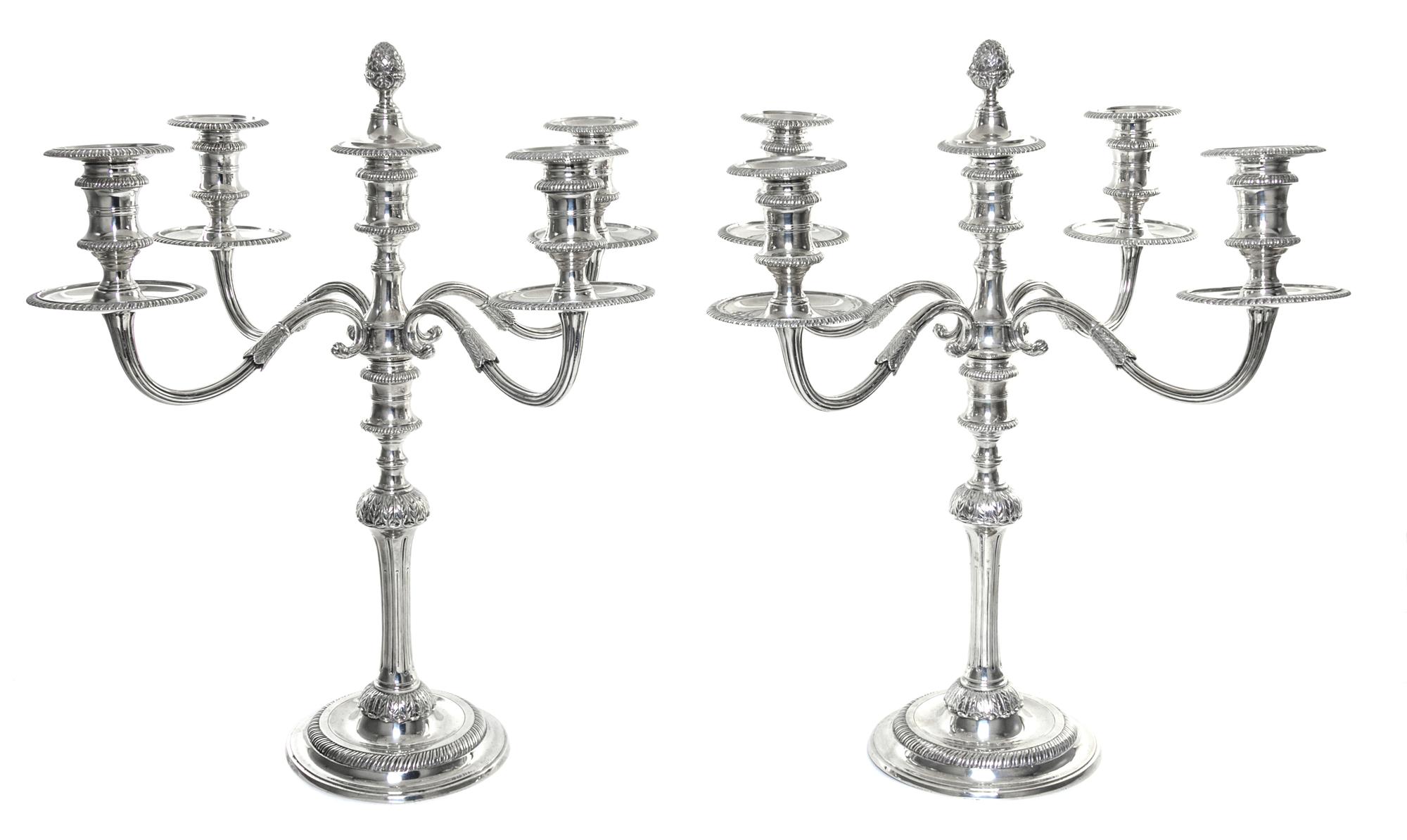 A Pair Elizabeth II Silver Five-Light Candelabra, Garrard & Co, London, 1925, each central cup with a removable pine-cone finial surmou