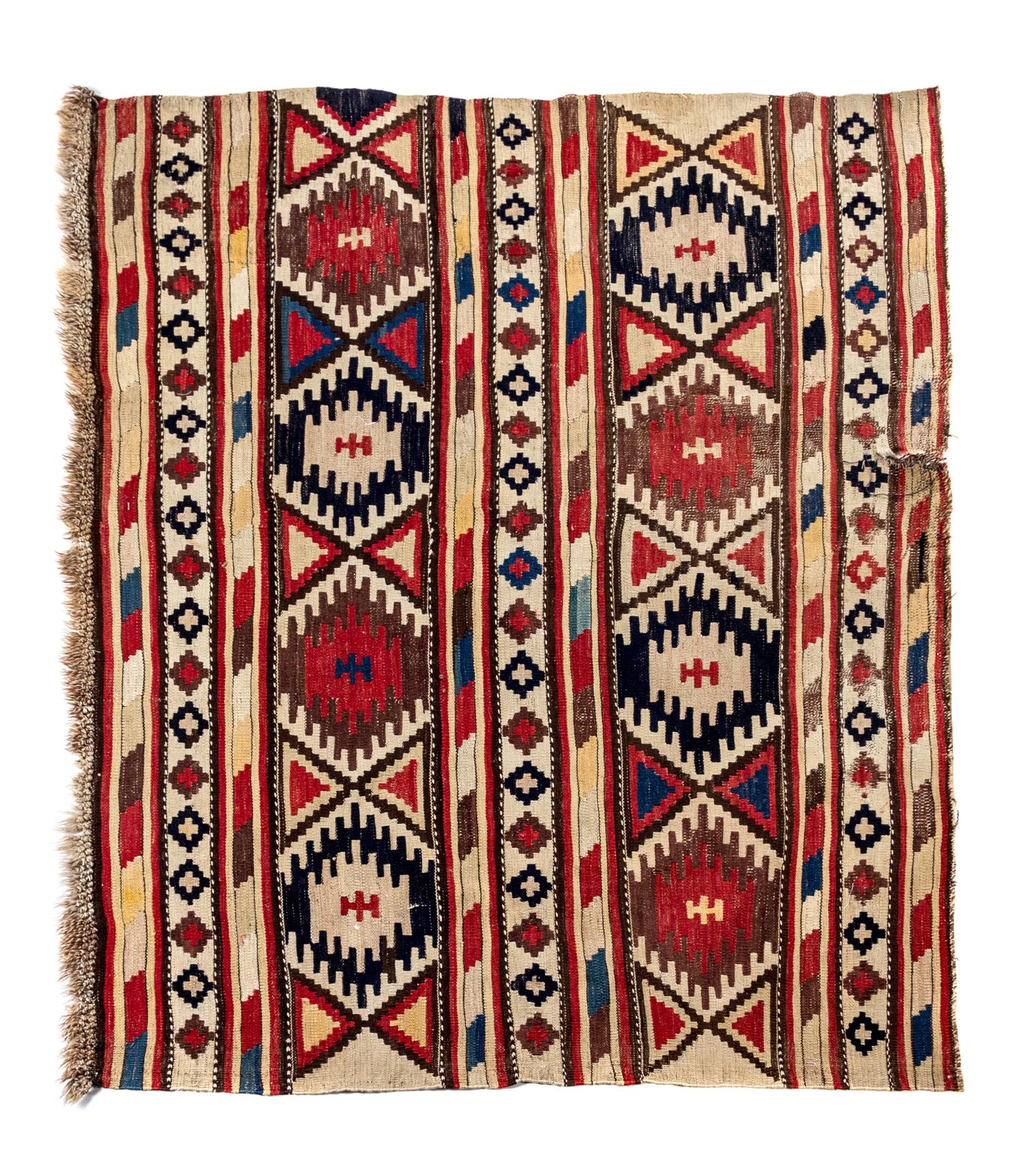 A Turkish Yastik Rug 2 feet 11 inches x 1 foot 10 inches. — CIRCA 1930