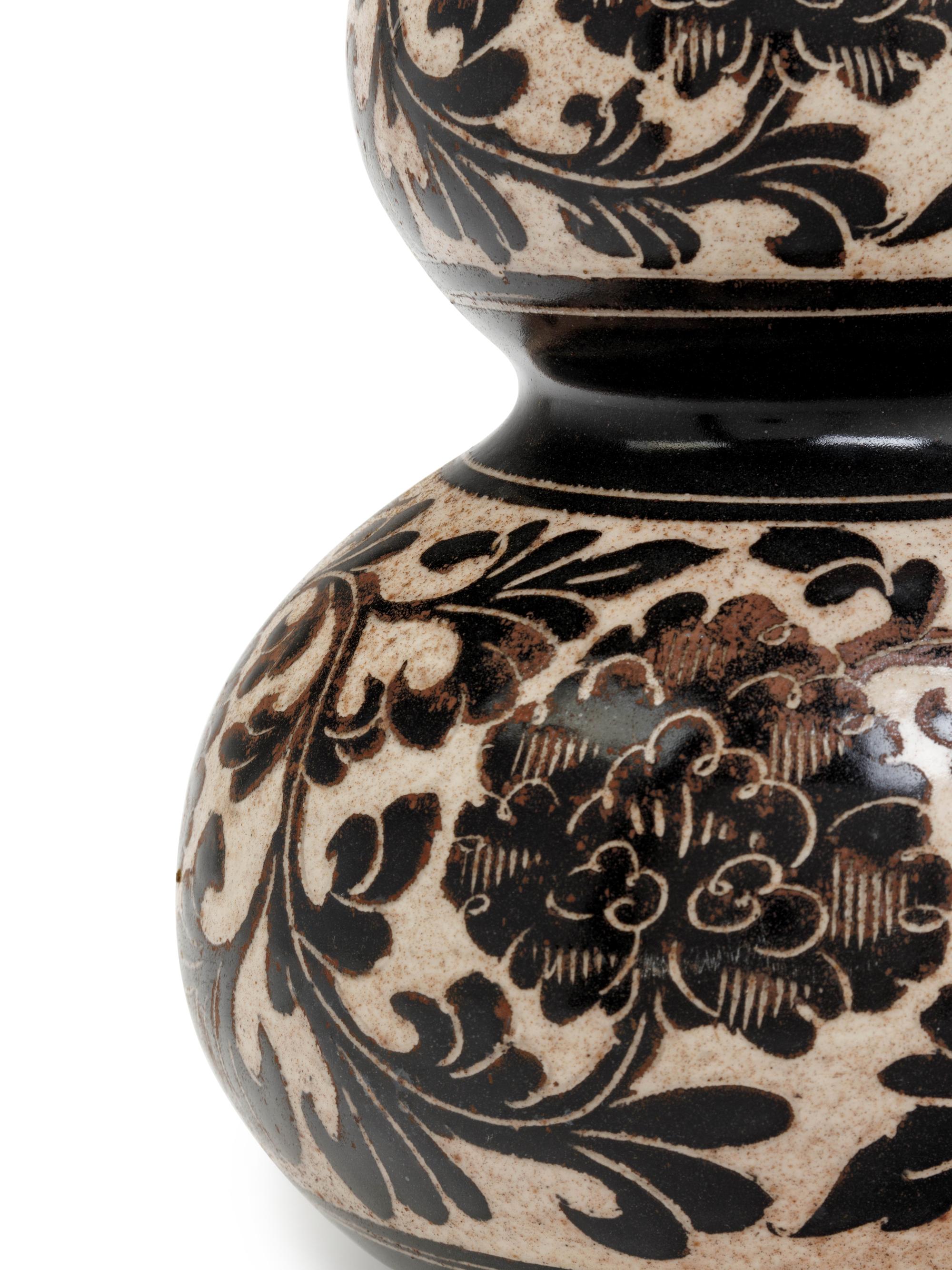 A Chinese Sgraffito White Ground Black Decorated Double Gourd Vase